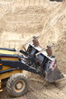 Yellow excavator construction site