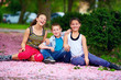 happy kids, teenagers having fun in blooming park