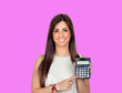 Photo: Beautiful girl with a calculator Beautiful girl with a calculator