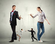 Businesspeople with marionettes