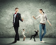 Businesspeople with marionettes