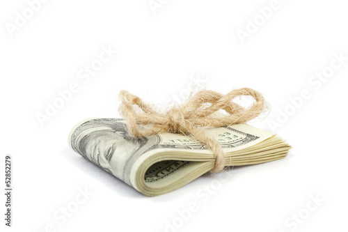 Photo: Roll of money isolated on white background Roll of money isolated on white background