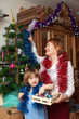 mature woman and baby during  Christmas