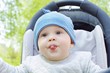 baby puts out tongue