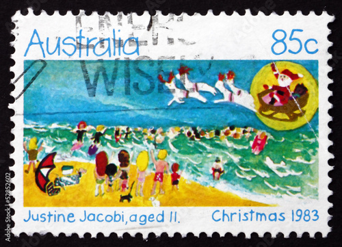 Photo: Postage stamp Australia 1983 Holiday Beach Scene, Christmas Postage stamp Australia 1983 Holiday Beach Scene, Christmas
