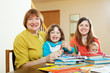 Portrait of senior woman with daughter and grandchildren