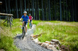 Two women riding bikes