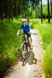 Foto: Two women riding bikes Two women riding bikes