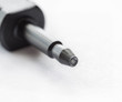 Fiber optic connector on the white background. Macro shot.
