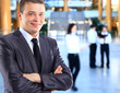 Photo: Businessman with coworkers. Businessman with coworkers.