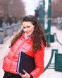 Photo: Beautiful girl walking down the street. Beautiful girl walking down the street.