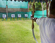 Archer takes aim at a target