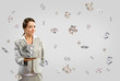 business woman smiling and holding a table