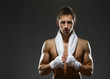 Portrait of fighter with white towel and his hands