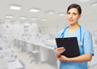 Young doctor with clipboard