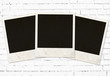 Illustration: three photo frames against white brick wall three photo frames against white brick wall