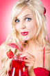 Surprised young woman drinking nightclub cocktail