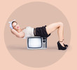 Photo: Strong pinup girl doing fitness exercises Strong pinup girl doing fitness exercises
