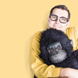 Big male goof cuddling toy gorilla. Comfort zone