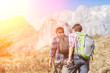 Photo: Young Couple Hiking in the Nature Young Couple Hiking in the Nature