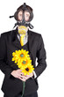 Man in gas mask with flowers
