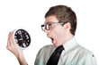 Scared businessman with clock