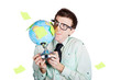 Isolated businessman holding world globe