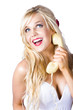Gorgeous blond woman laughing on telephone call