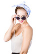 Woman smiling over sun glasses