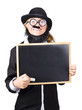 female comedy teacher with blank blackboard