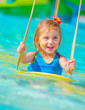 Cheerful girl in aqua-park