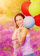 Foto: Cute female with balloons Cute female with balloons