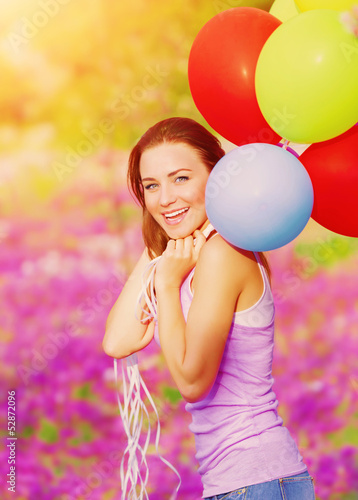 Photo: Cute female with balloons Cute female with balloons