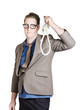 Helpless businessman holding rope with tied noose