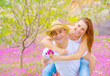 Young family in summer garden