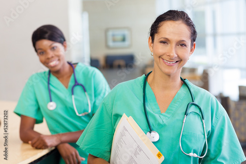 Photo: Nurses at work station Nurses at work station