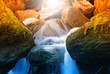 little waterfall in the river at twilight