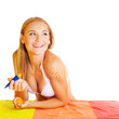 Pretty woman applying suncream
