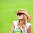 Happy woman on green grass