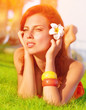 Photo: Cute female on green grass Cute female on green grass