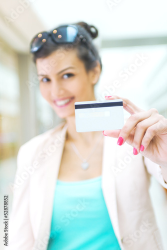 Photo: Shopping time, focus on credit card Shopping time, focus on credit card