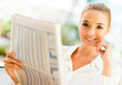 Woman reading the newspaper