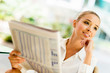 Photo: Business woman reading paper Business woman reading paper