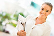 Business woman holding documents