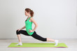 Portrait of beautiful young woman exercises