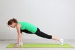Portrait of beautiful young woman exercises