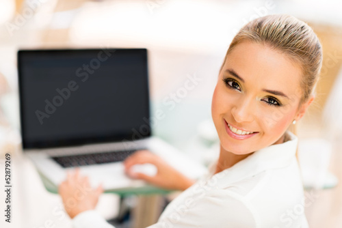 Photo: Business woman working online Business woman working online