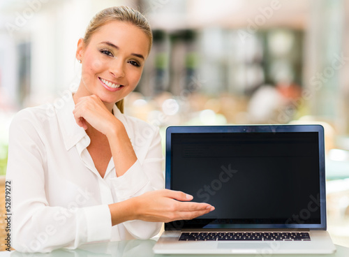 Photo: Business woman with a laptop Business woman with a laptop