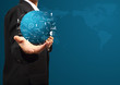 Global business plan in hand of businessman