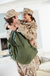 Photo: Military Couple Greeting Each Other On Home Leave Military Couple Greeting Each Other On Home Leave
